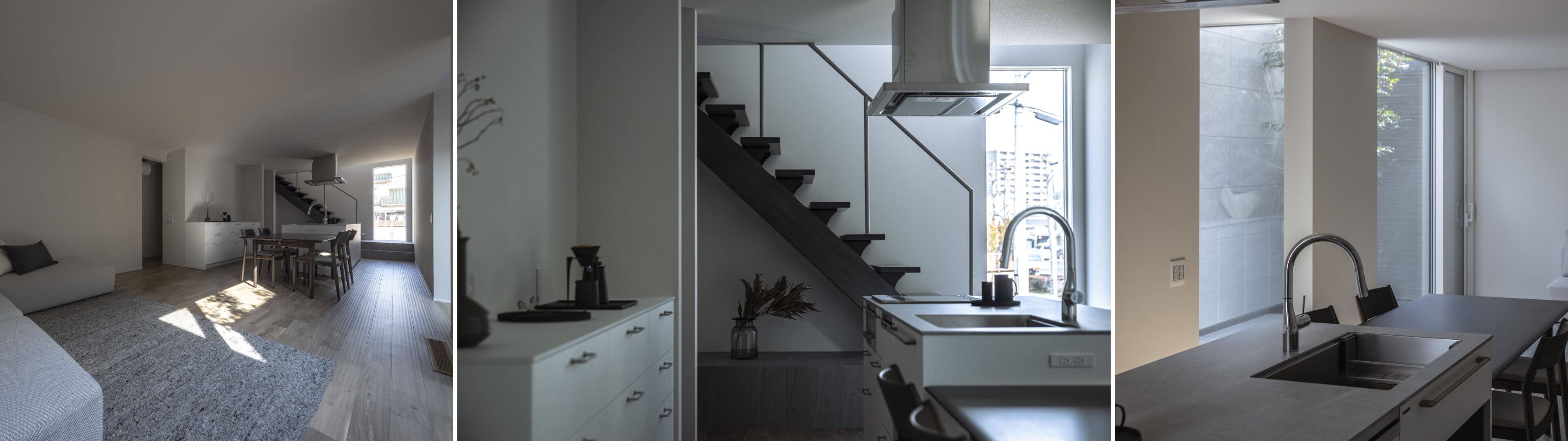 リビング・ダイニング・キッチンと階段まわりを横並びで見せた、内観全景の様子