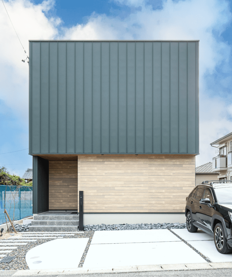 ご夫妻の好きなモスグリーンが彩る家